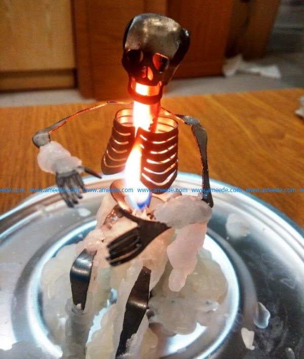 Skeleton-shaped candle holder