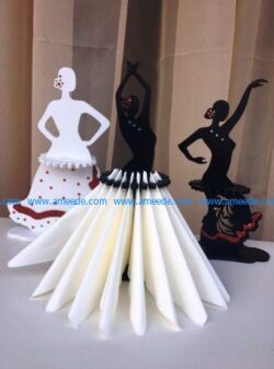 a set of napkins in the shape of dancers